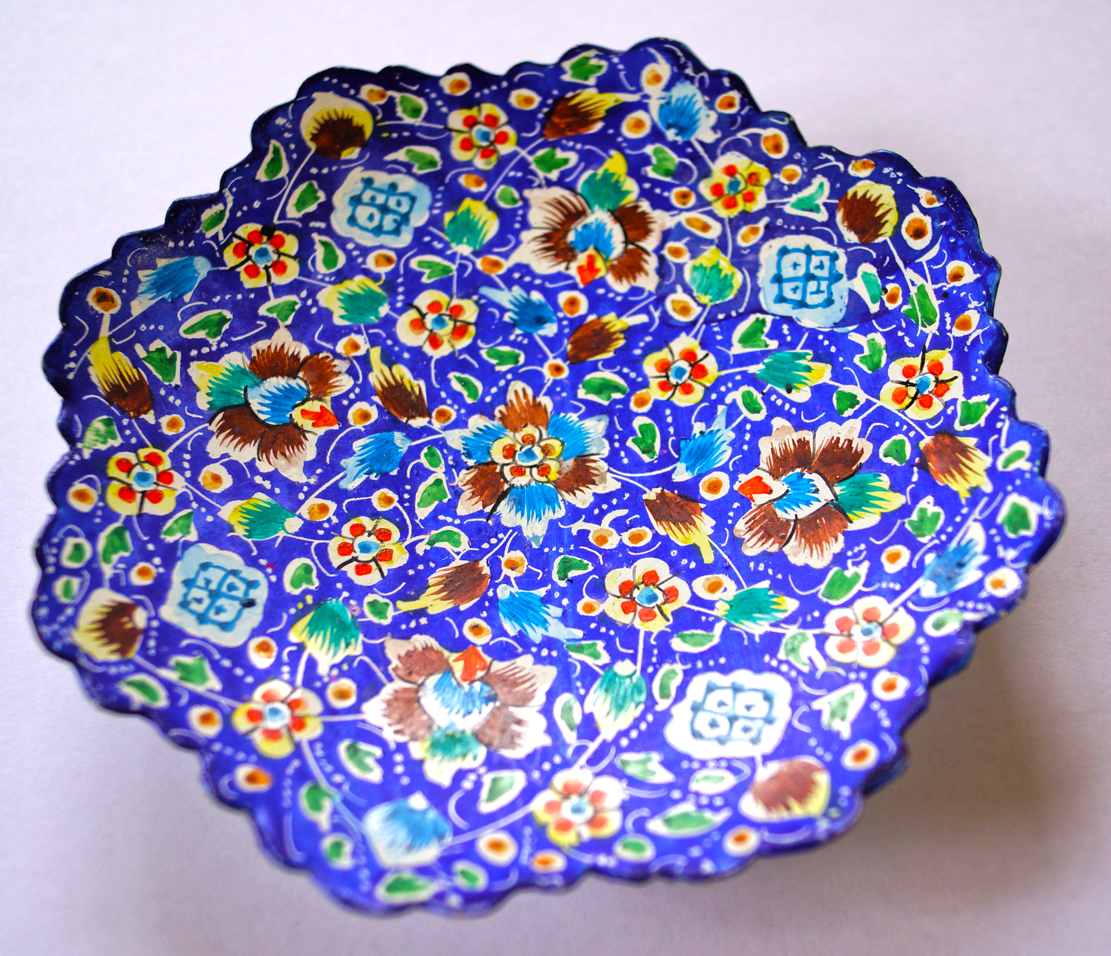 Persian Mina-kari enamelled copper plate with floral arabesques, Isfahan