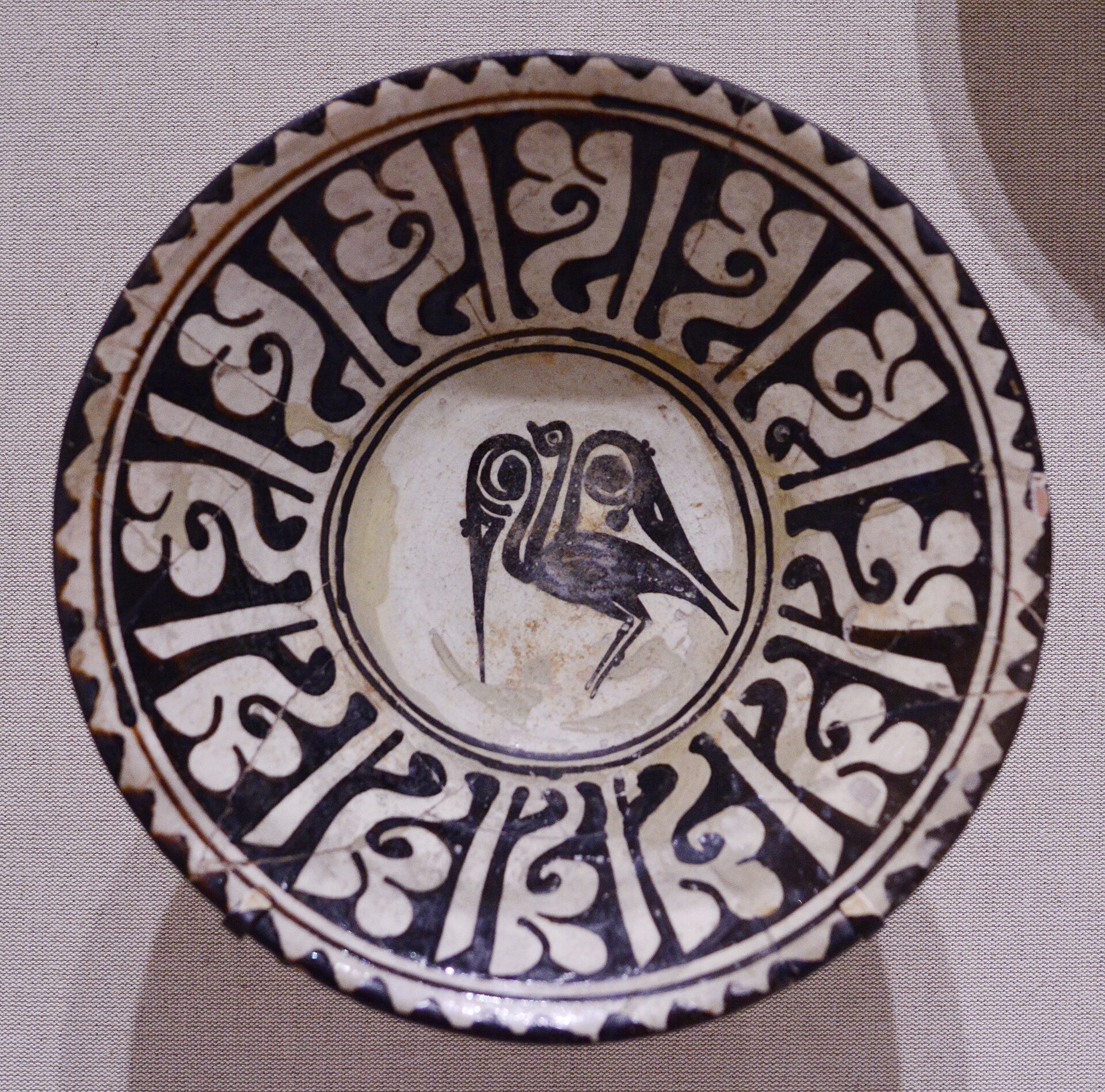 Iranian bowl with bird and calligraphy, 9th-10th-century Iran. In the permanent collection of the San Diego Museum of Art, San Diego, California.