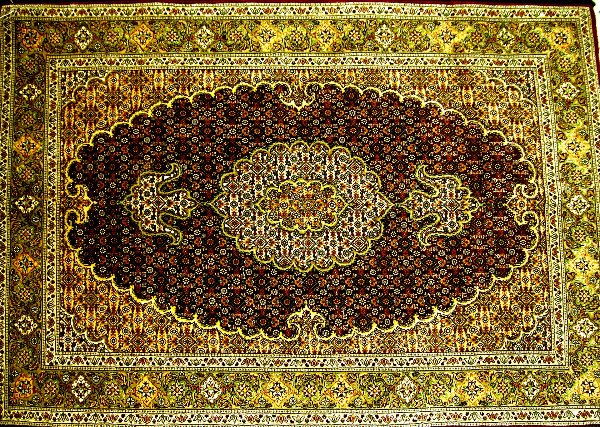 Rug from Tabriz, Iran. made of wool and silk. "fish design"