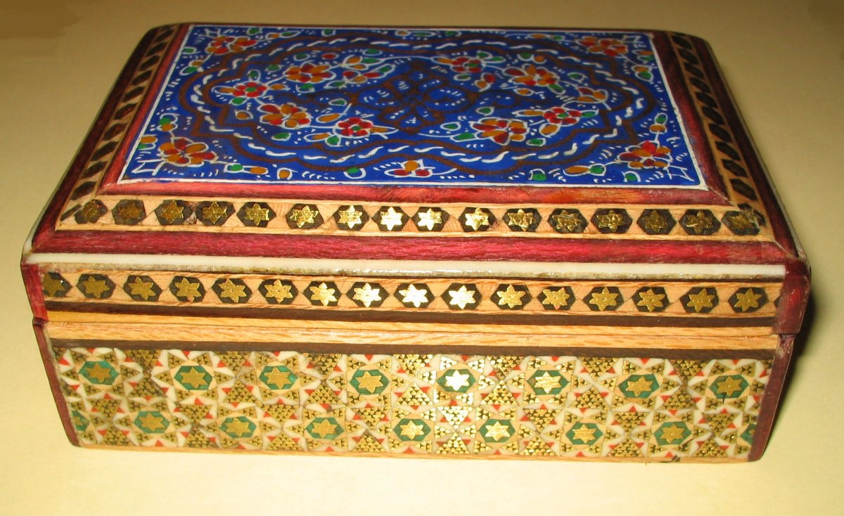 Box painted and decorated with Khatam kari marquetry, a typical kind of work in wood from Iran.