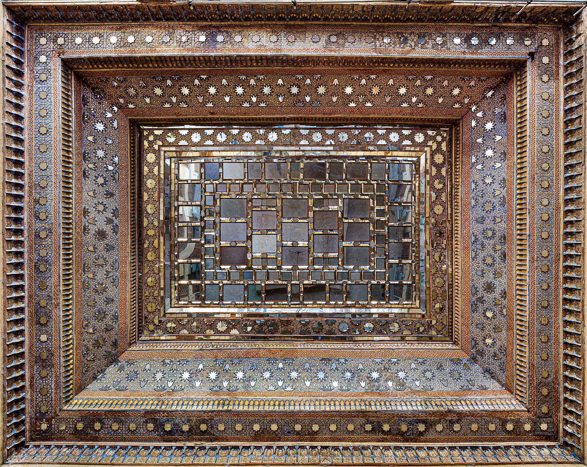 The ceiling of Chehel Sotoun's mirror hall that contains Āina-kāri art.
