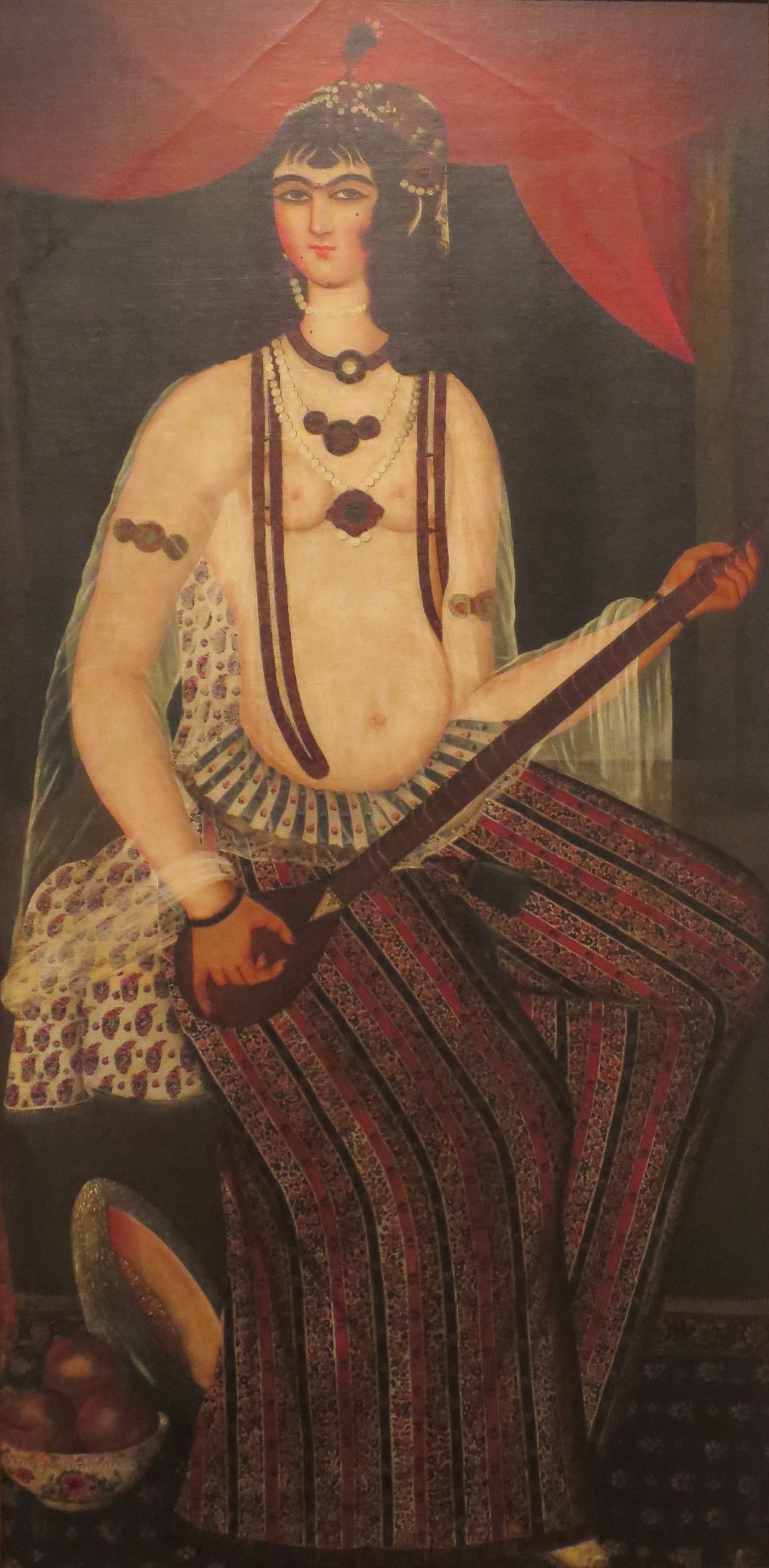 Female Musician with a Stringed Instrument , anonymous painting from Iran, Qajar period, early 19th century, oil on canvas, long-term loan to the Honolulu Museum of Art by Doris Duke Foundation for Islamic Art (accession 34.6)