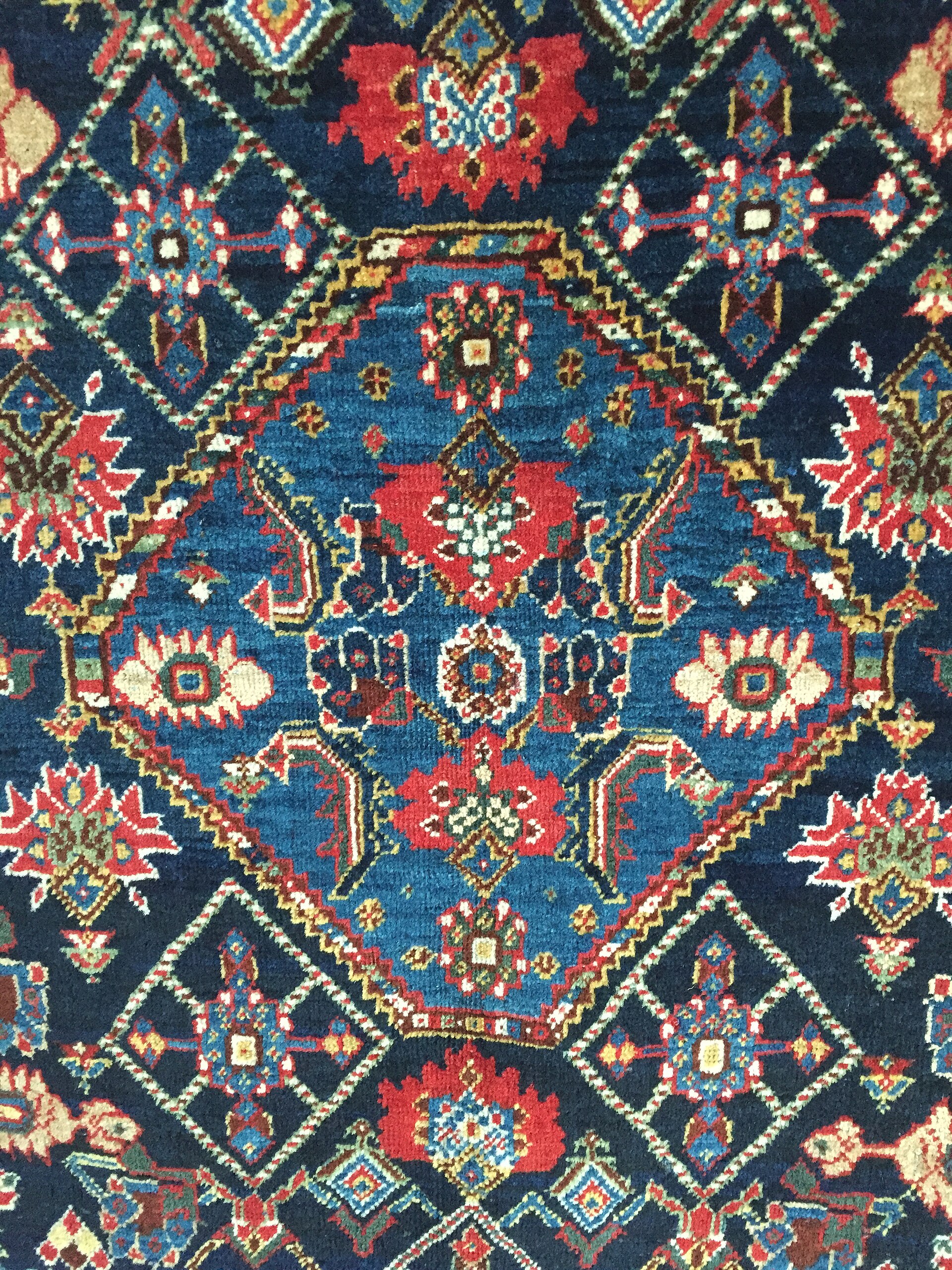 Section (central medaillon) of a South Persian rug, probably Qashqai, late 19th century, showing irregular colours (abrash)