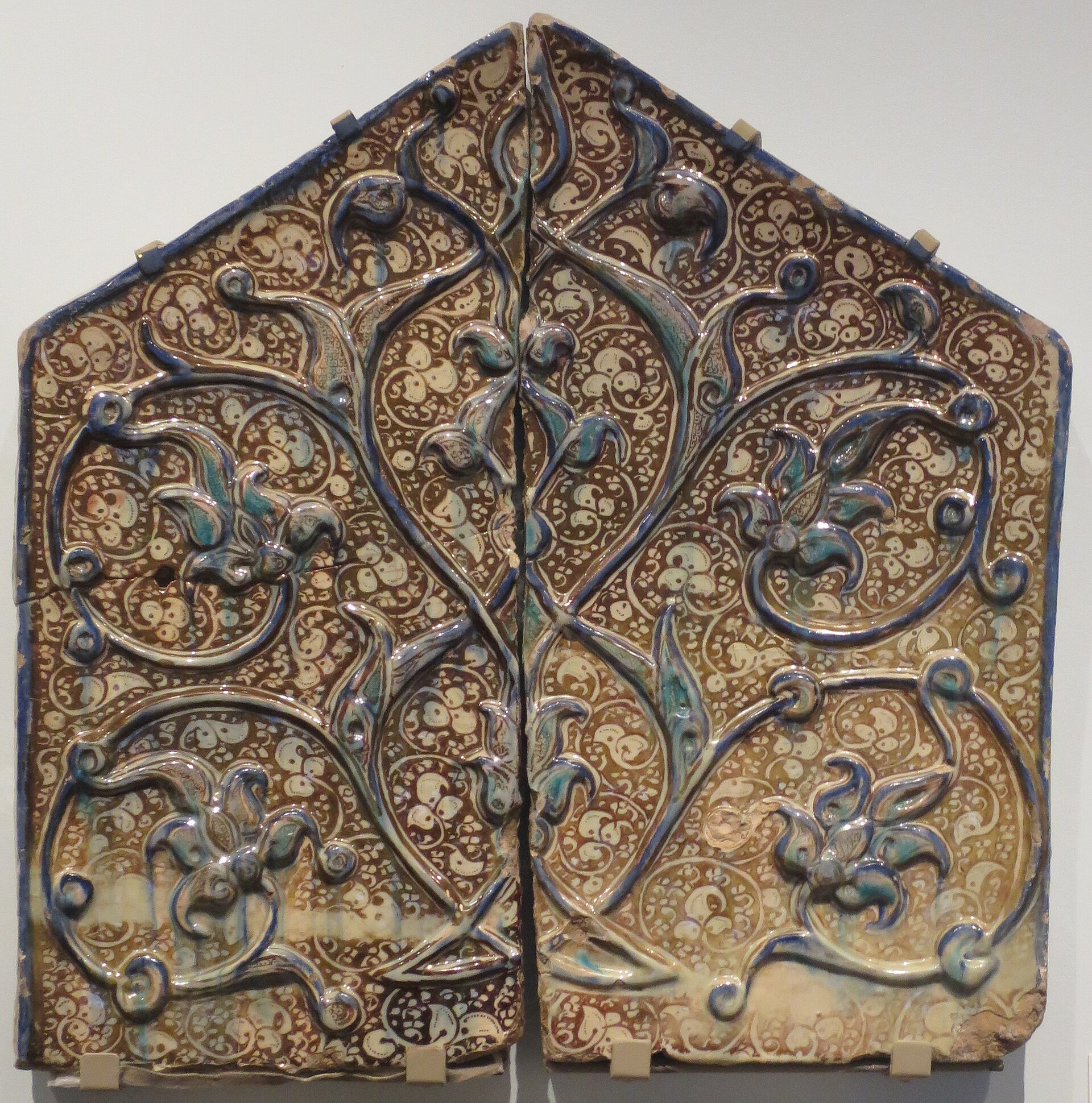 Fragment from a Mihrab, Ilkhanid period, late 13th or early 14th century, Kashan, Iran, glazed stone-paste, underglaze painted and overglaze painted luster, Honolulu Museum of Art