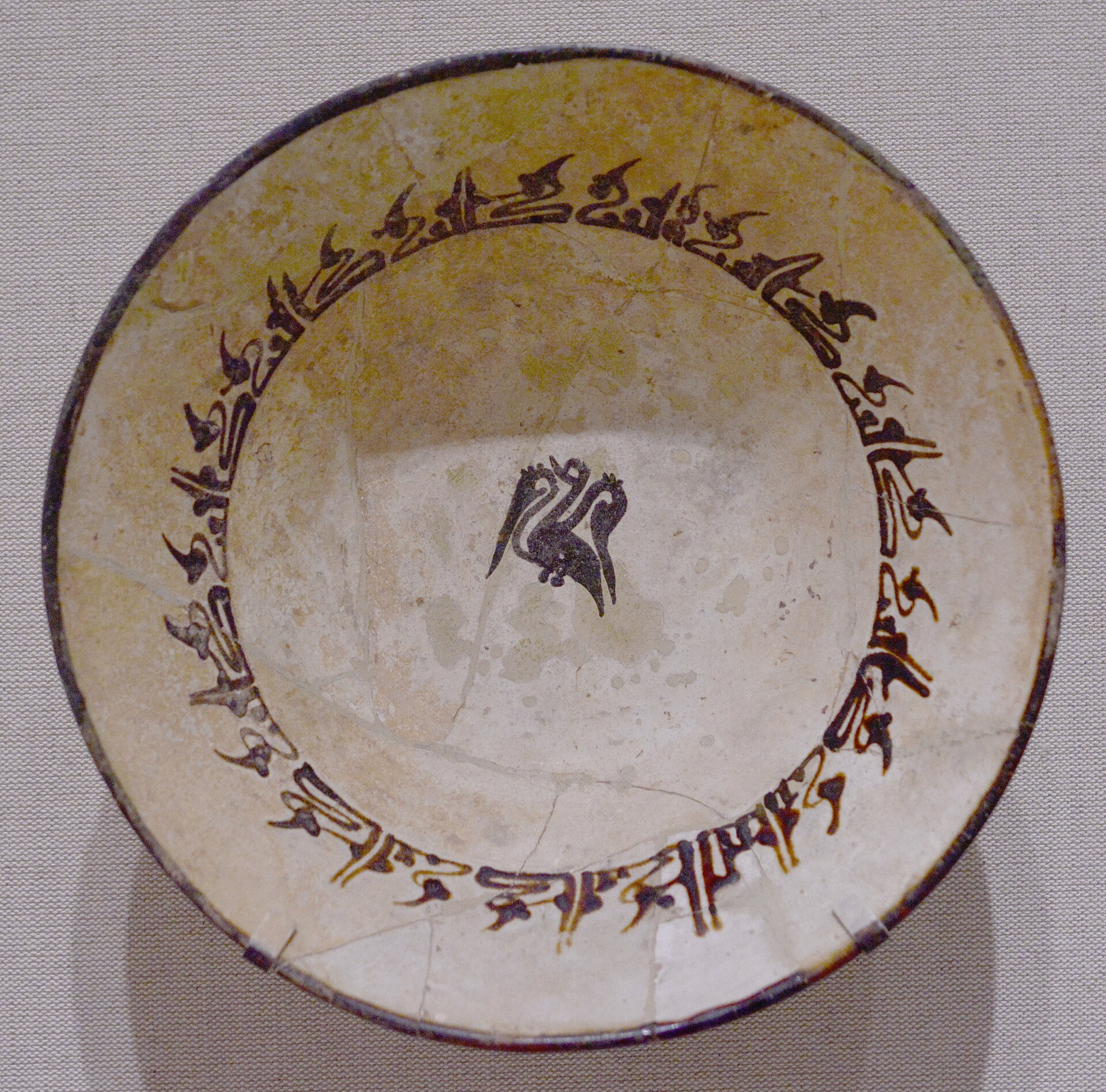 Iranian bowl with bird and calligraphy, 9th-10th-century Iran. In the permanent collection of the San Diego Museum of Art, San Diego, California.