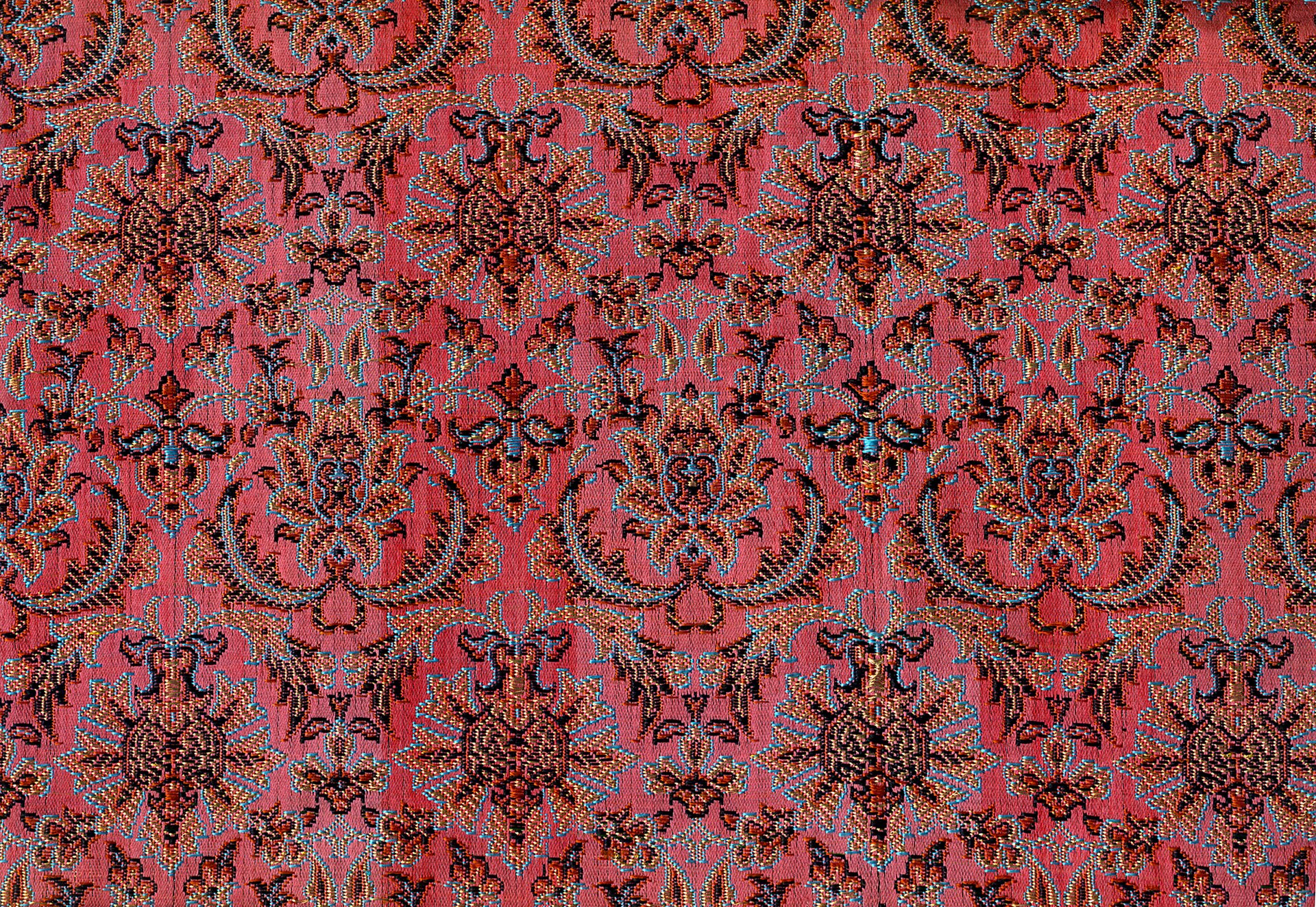 Persian Silk Brocade. Persian Textile (The Golden Yarns of Zari - Brocade). Silk Brocade with Golden Thread ( Golabetoon ). Texture Type: Lower Warp (Brocade Atlasi) . Jacquard. Pattern and Design: Shah Abbasi Flower, With Main Repeating Motif. Brocade weaver: Master Seyyed Hossein Mozhgani. 1974 A.D. Brocade Designer (Pattern Designer): Master Mohammad Tarighi. 1974 A.D. Pahlavi Dynasty. the Ministry of Culture and Art . Honarhaye Ziba workshop.