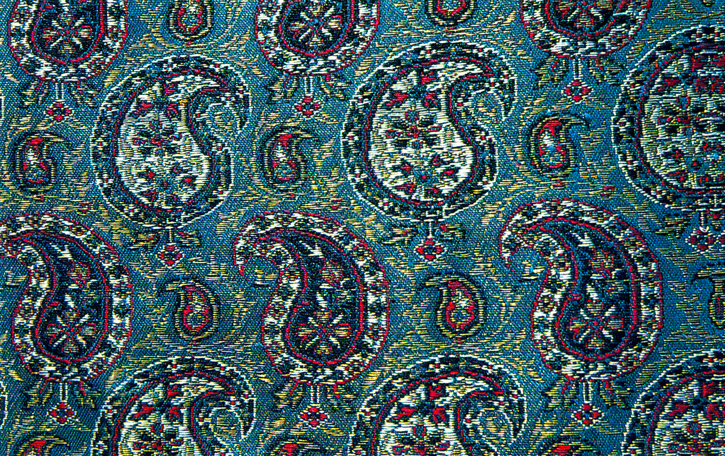 Persian Silk Brocade. Persian Textile (The Golden Yarns of Zari - Brocade). Silk Brocade with Golden and Silver Thread ( Golabetoon ). Texture Type: Lower Warp (Brocade Atlasi) . Jacquard. Pattern and Design: Paisley Left and Right (Bote Jeghe) , With Main Repeating Motif. (Persian Paisley) Brocade weaver: Master Seyyed Hossein Mozhgani. 1963 A.D. Brocade Designer (Pattern Designer): Master Reza Vafa Kashani. 1939 A.D. Pahlavi Dynasty. the Ministry of Culture and Art . Honarhaye Ziba workshop.
